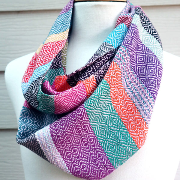 Handwoven cotton scarf in various bright coloured stripes