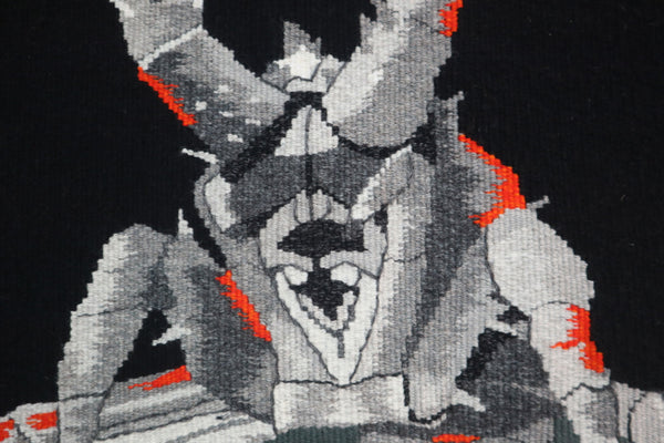 detail of unique hand woven tapestry of Larry The Lobster in Kingston SE, with black background to give a sinister gothic feeling