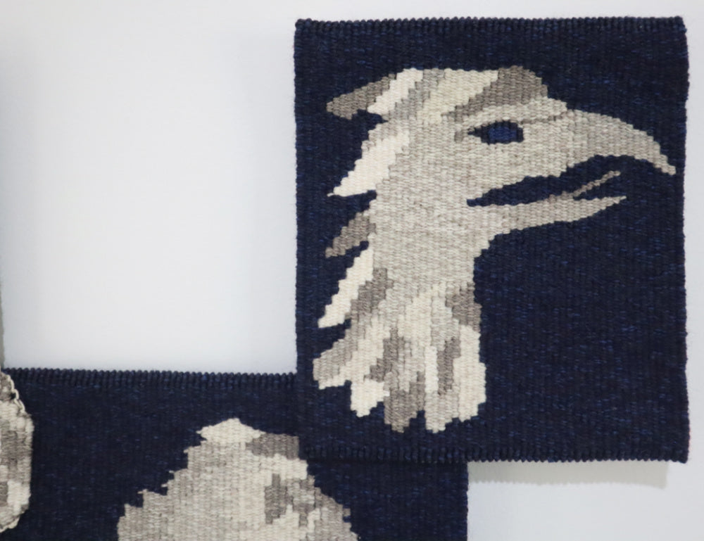 detail of unique tapestry based on a mythical griffin