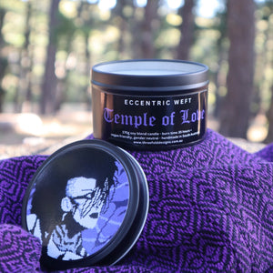 handmade soy candle with artwork of jonny slut specimen on lid - teak neroli tobacco hay goth candle