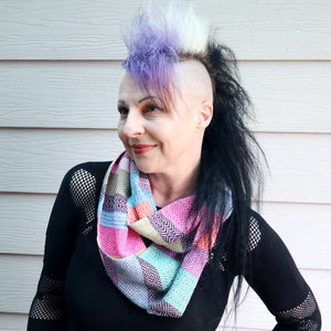 Michelle wearing a handwoven multi coloured infinity scarf