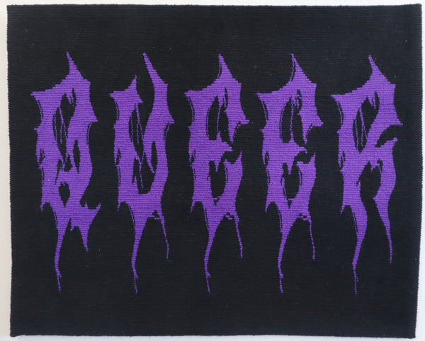 unique artwork of text saying 'queer' in purple death metal typeface font