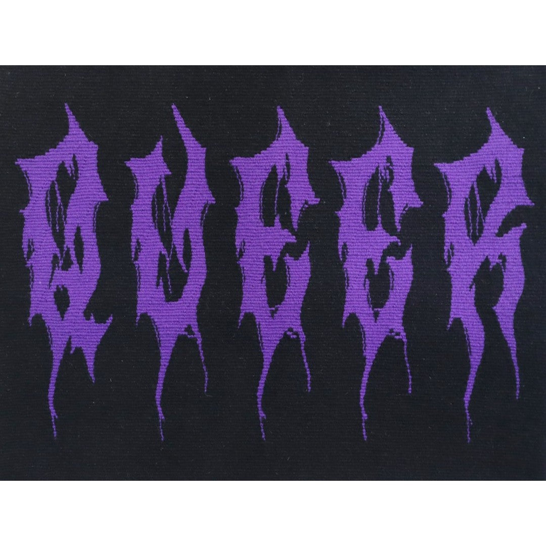 unique artwork of text saying 'queer' in purple death metal typeface font