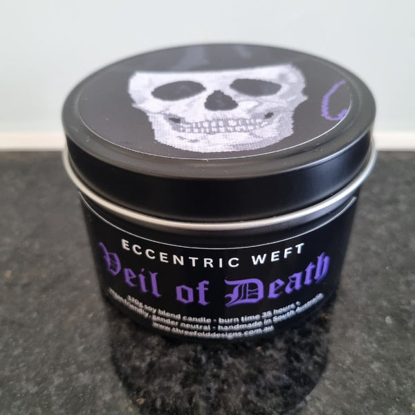 handmade soy candle with artwork of skull on lid - masculine fragrance, aftershave, goth candle
