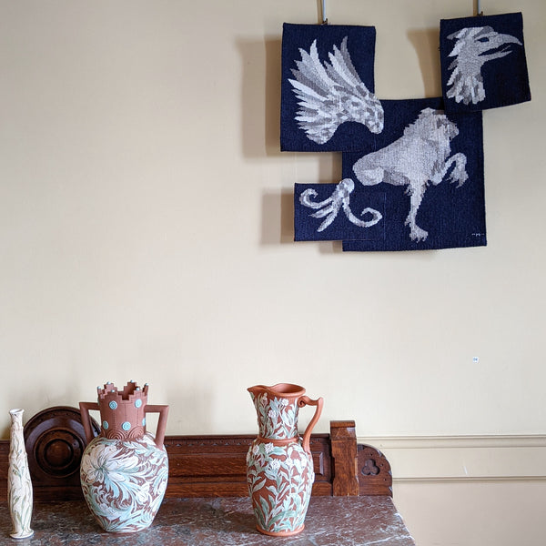 unique tapestry based on a mythical griffin displayed at urrbrae house