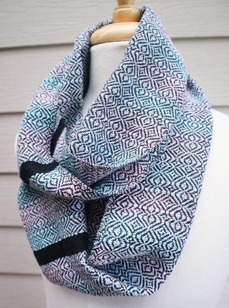 handwoven loop scarf, pastel colours and black, sophisticated, elevated